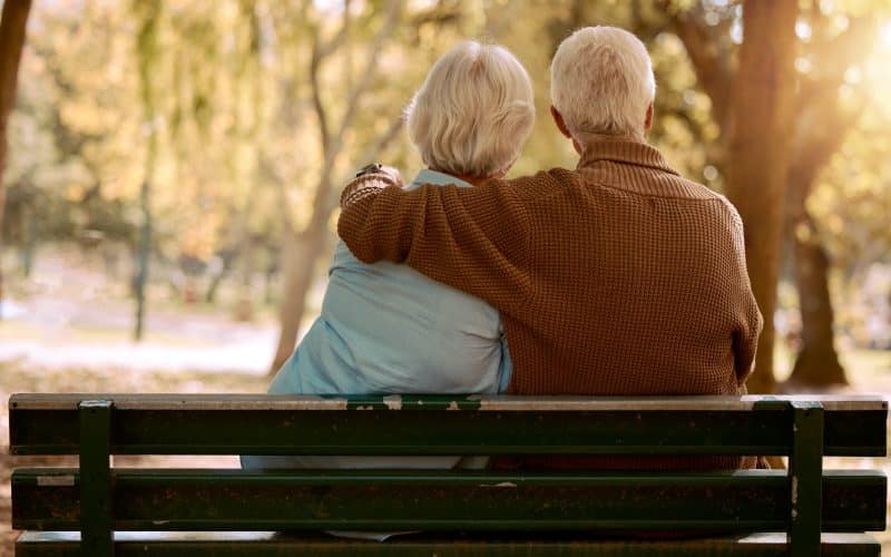 Love,,Hug,And,Old,Couple,In,A,Park,On,A